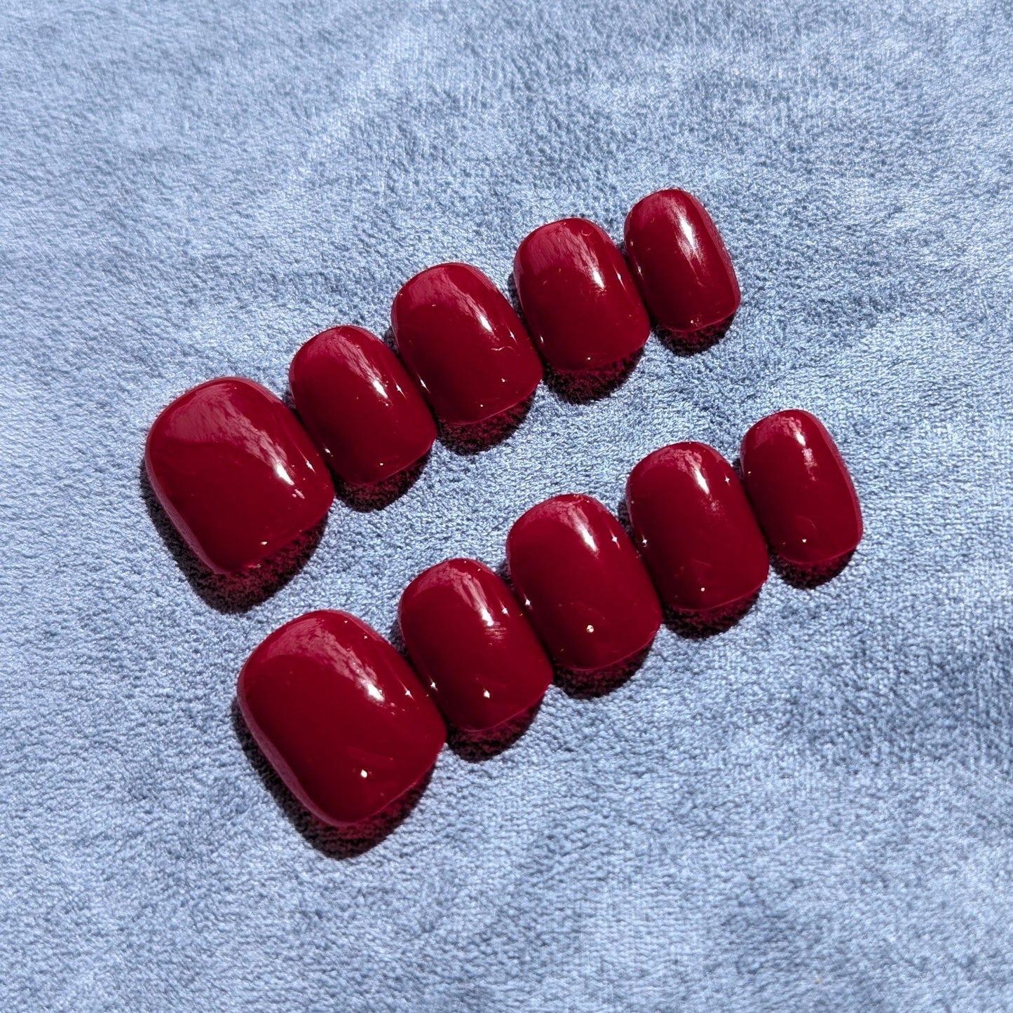 Luxury handmade press on nails in true red in extra short