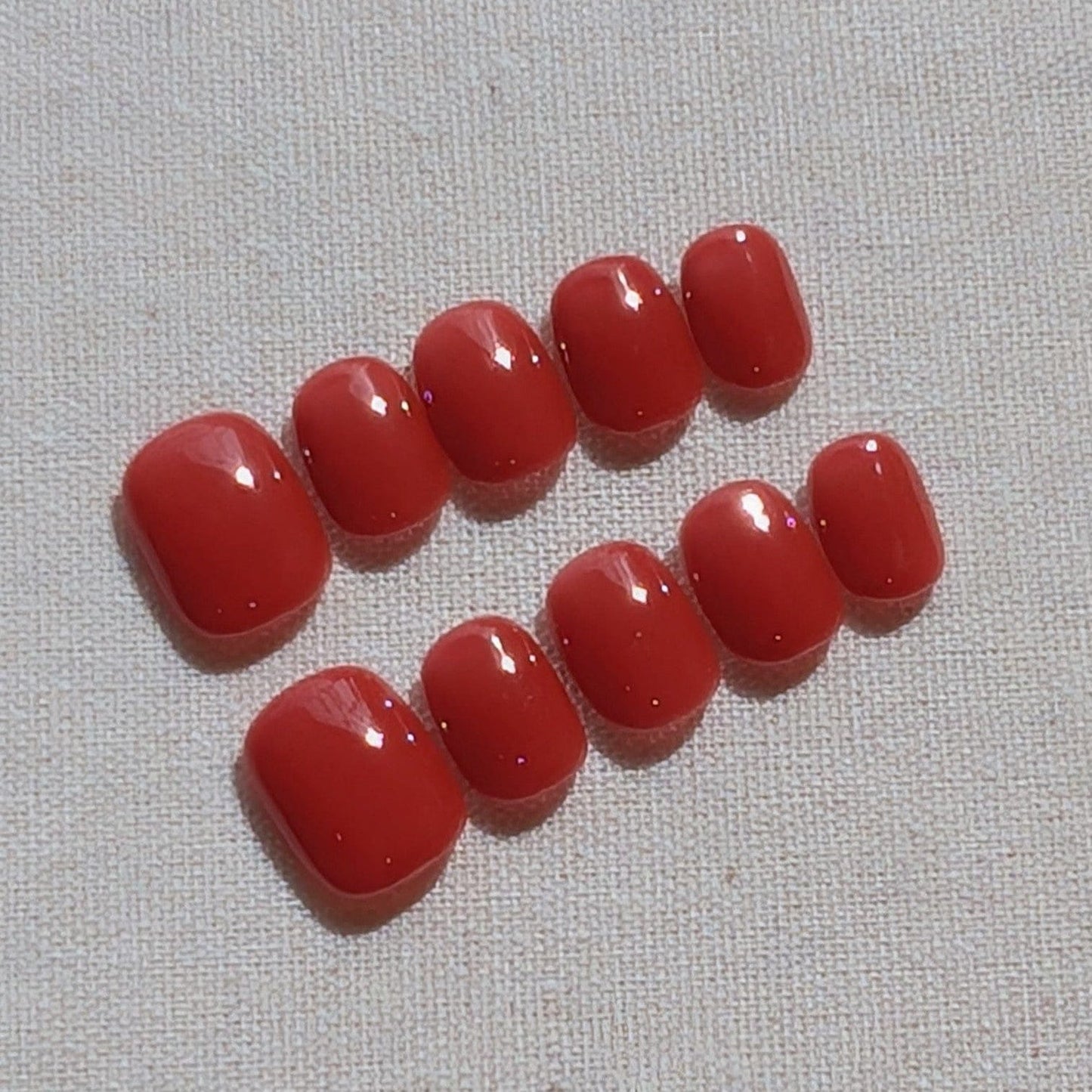 Calm Storm premium press-on nails in brick red in extra short round