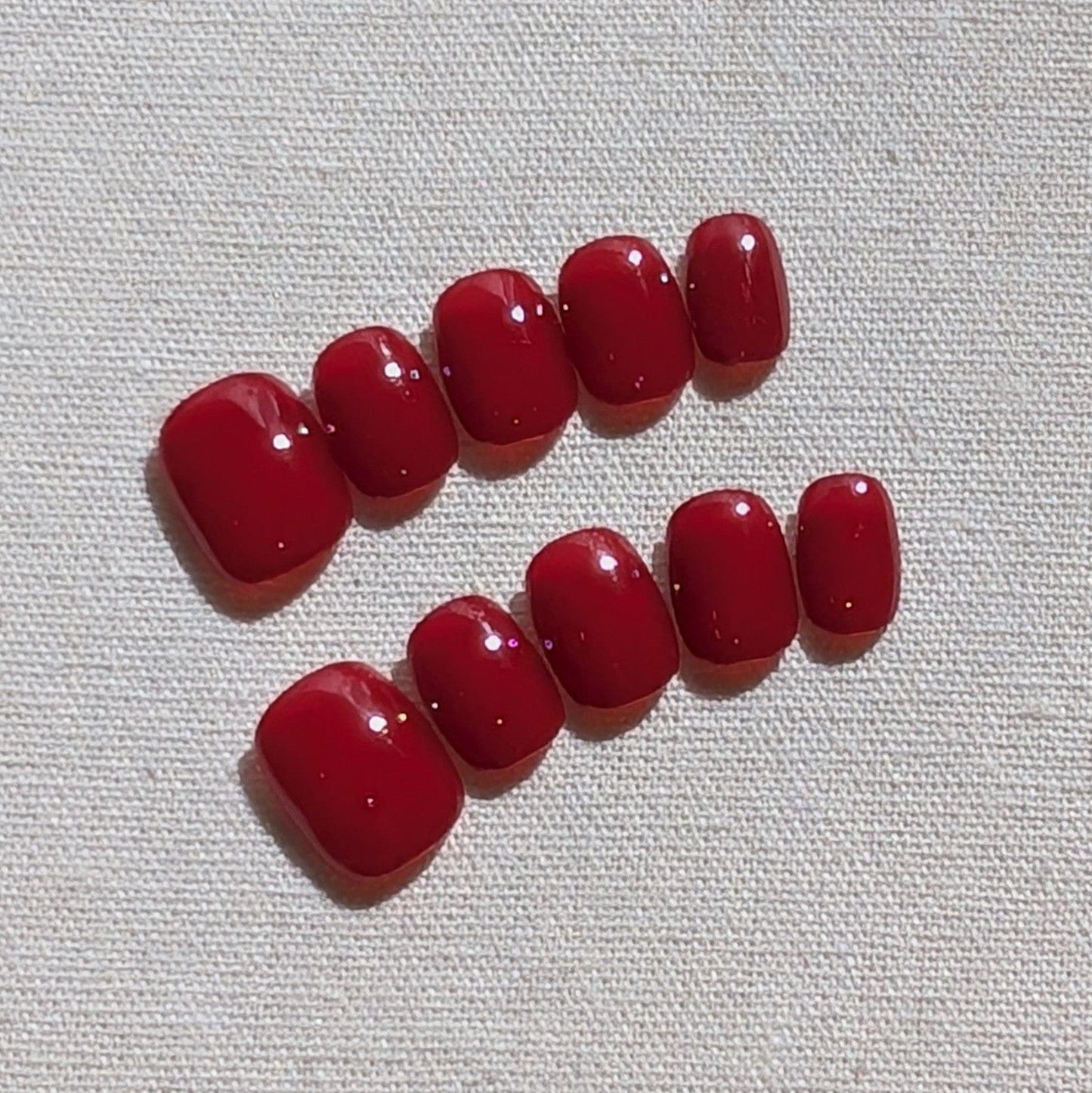 Calm Storm premium press on nails in classic glossy red in extra short