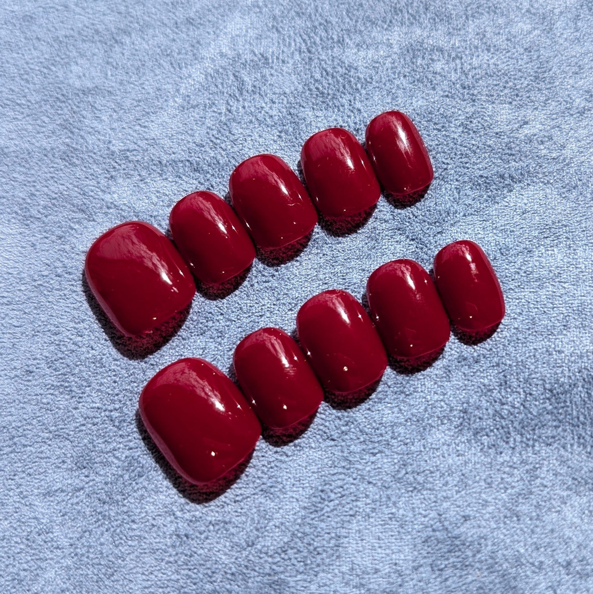 Luxury handmade press on nails in true red in extra short