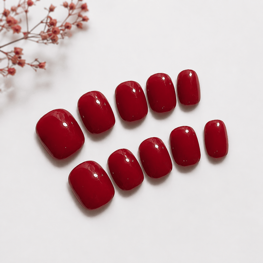 Calm Storm premium press on nails in classic red in extra short. 