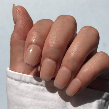 Calm Storm premium handmade press-on nails in clear nude in short square. 