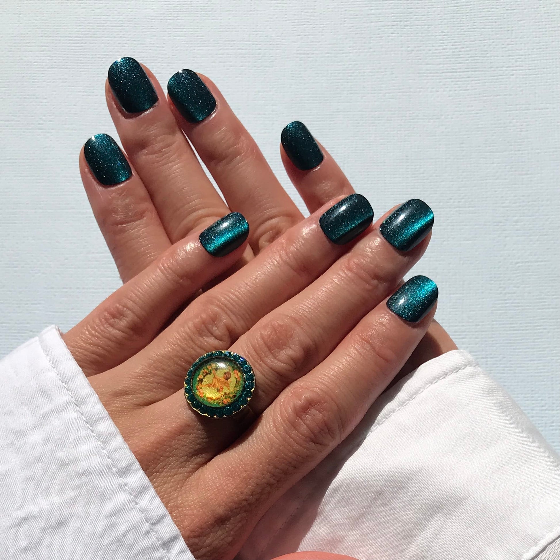 Calm Storm premium handmade midnight blue press-on nails in extra short. 