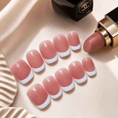 Calm Storm handmade French tip nails in short square. 
