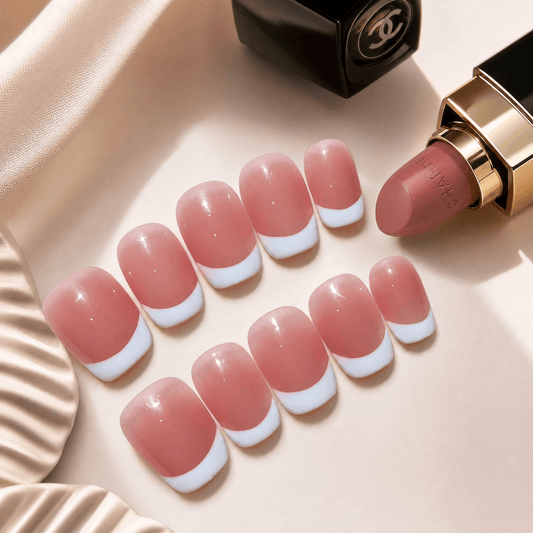 Calm Storm handmade French tip nails in short square. 