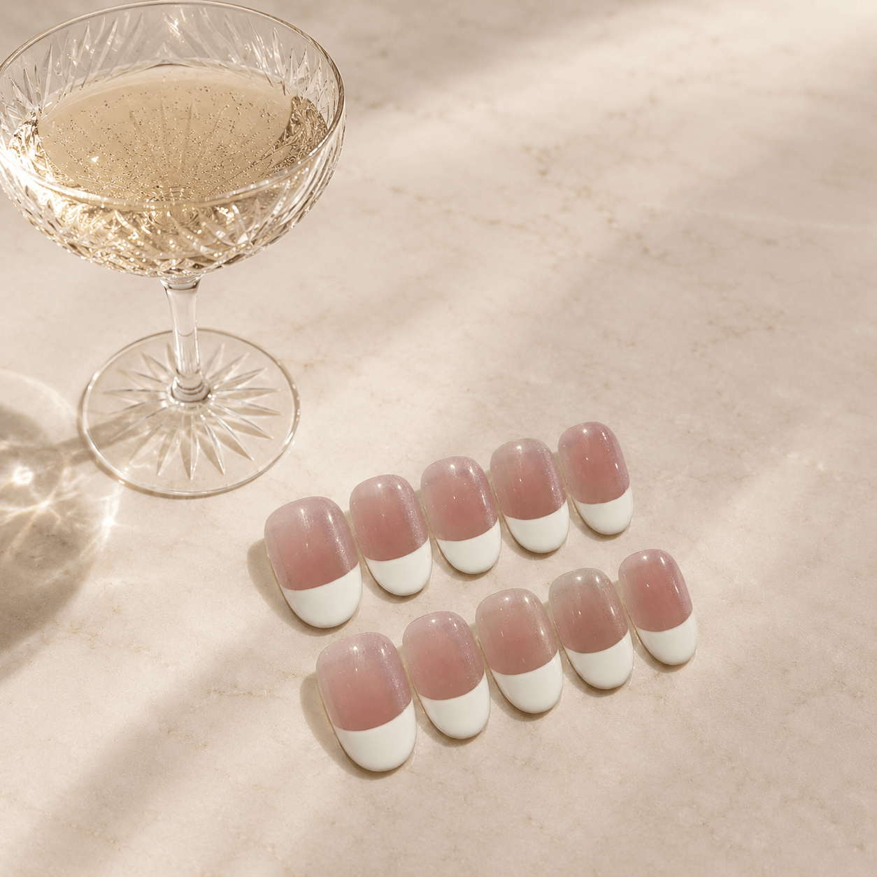 Calm Storm premium handmade French nails in short oval. 