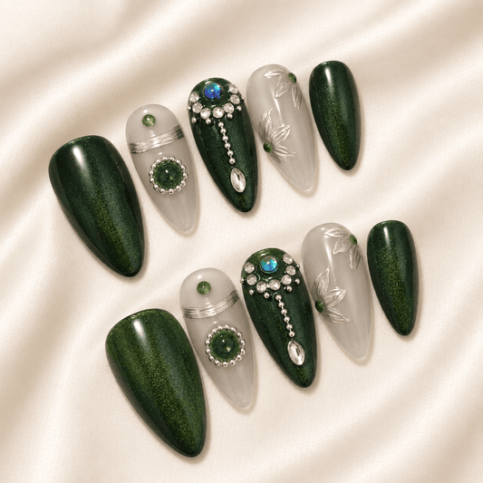 Calm Storm premium handmade press-on nails in emerald green featuring silver beads and floral design.