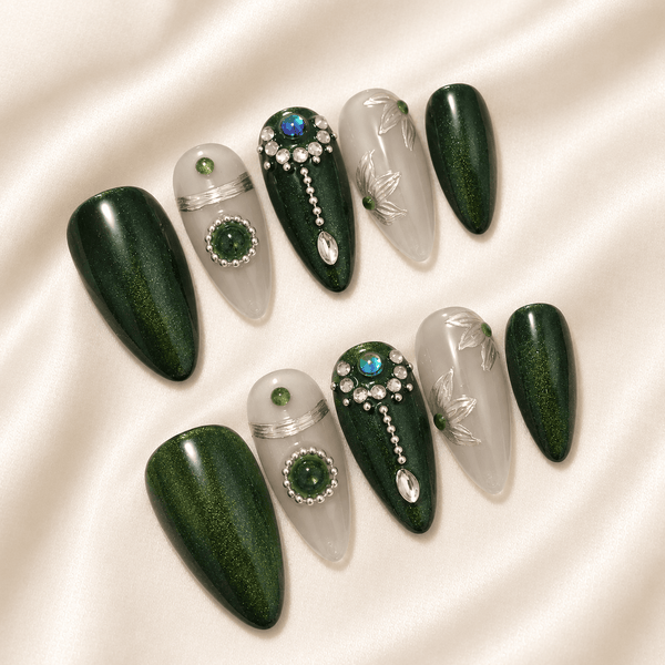 Calm Storm premium handmade press-on nails in emerald green featuring silver beads and floral design.