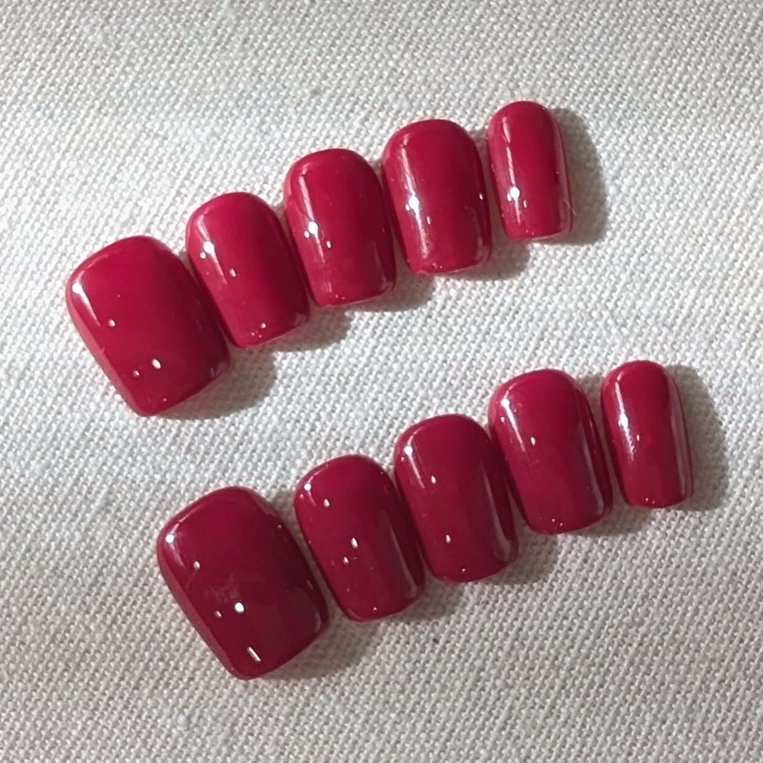 Calm Storm premium handmade press-on nails in fuchsia pink.