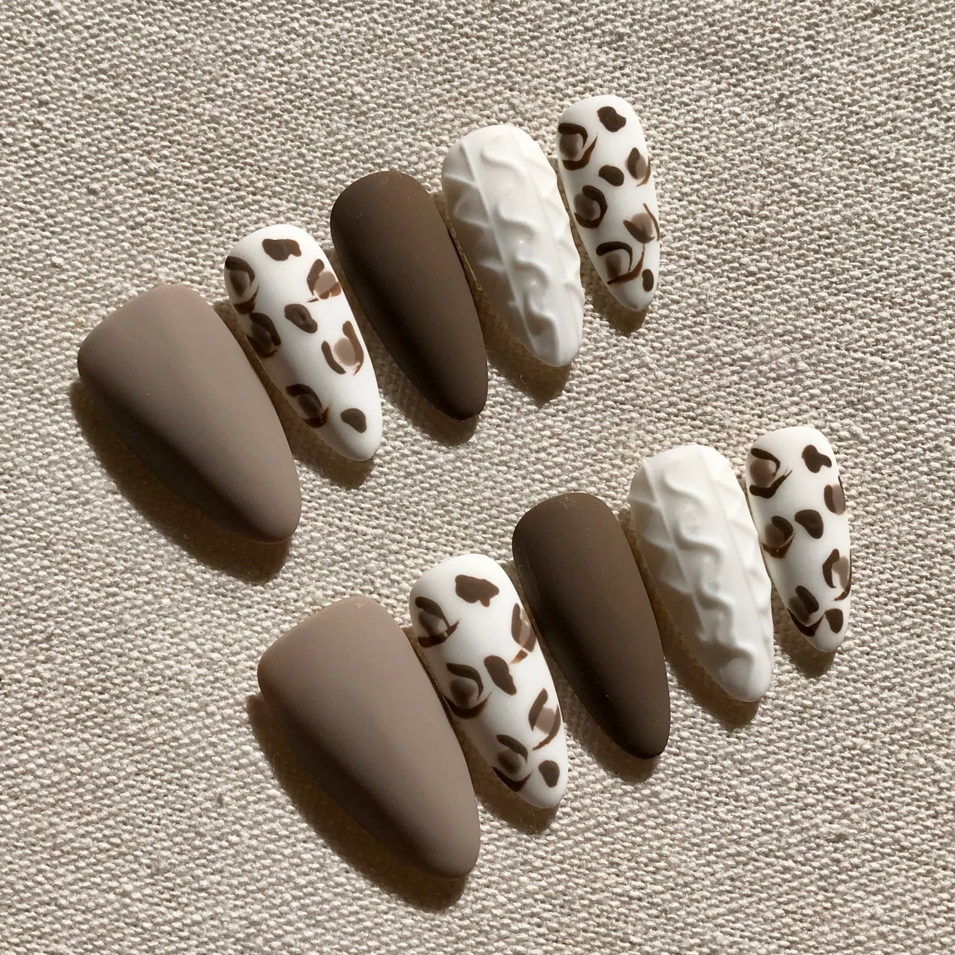 Calm Storm Premium handmade press-on nails with leopard print and 3D design in a modern matt finish. 