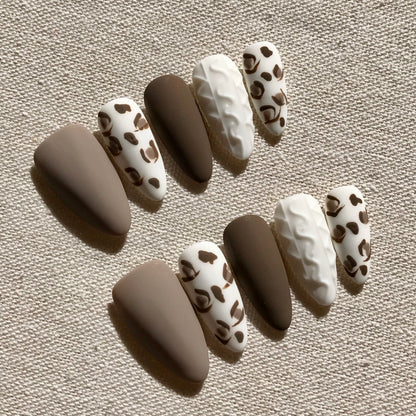 Calm Storm Premium handmade press-on nails with leopard print and 3D design in a modern matt finish. 
