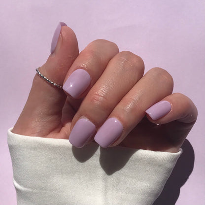 Handmade, salon quality high gloss press-on nails in lilac short square. 