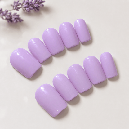 Calm Storm premium handmade nails in pastel lilac in square shape. 
