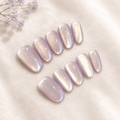 Calm Storm handmade press-on nails with a shimmering iridescent lavender-pink finish.