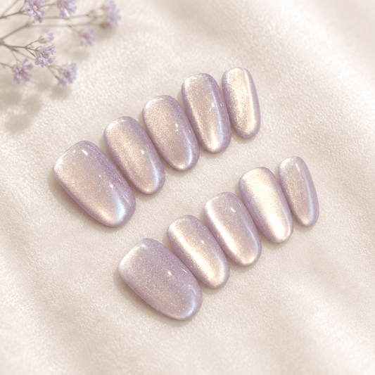 Calm Storm handmade press-on nails with a shimmering iridescent lavender-pink finish.