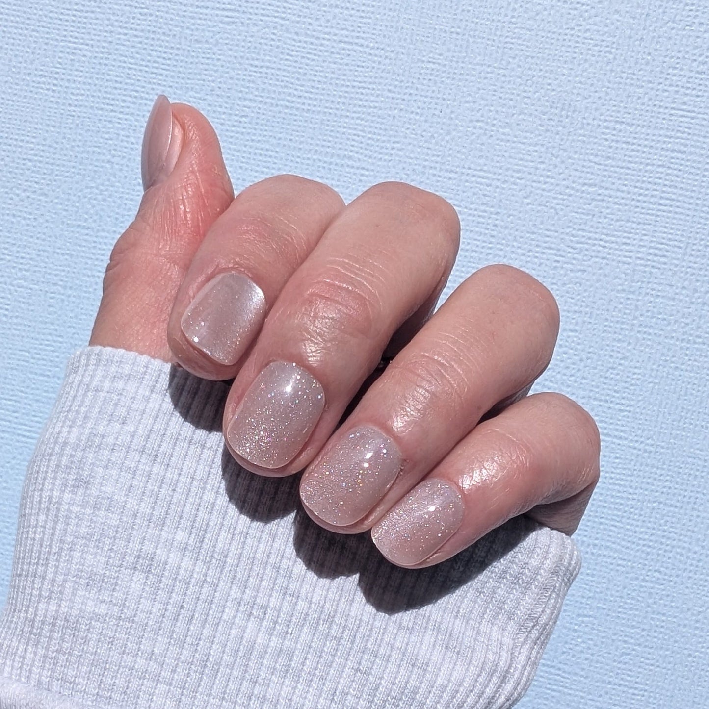 Barely there pale pink press-on nails in extra short