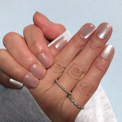Salon quality press-on nails in pale pink cat eye in extra short.
