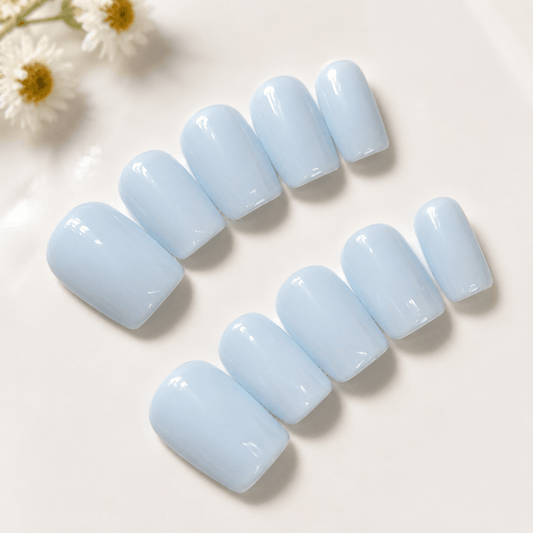 Calm Storm handmade press on nails in pastel blue in square shape.