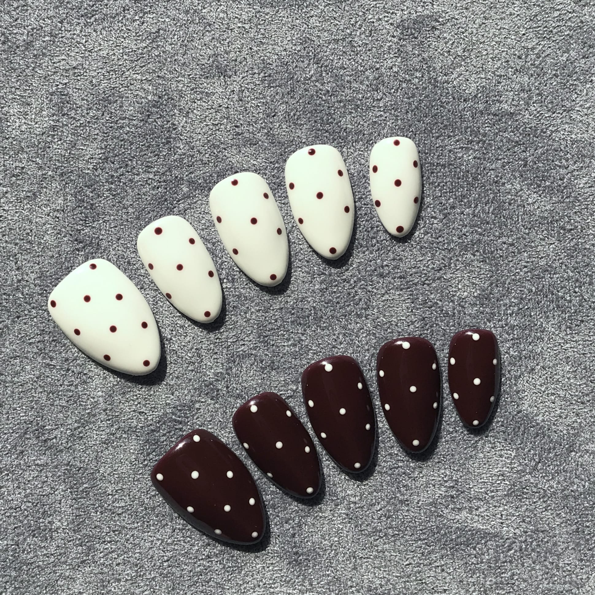 Handmade salon quality press-on nails with polka dot design.