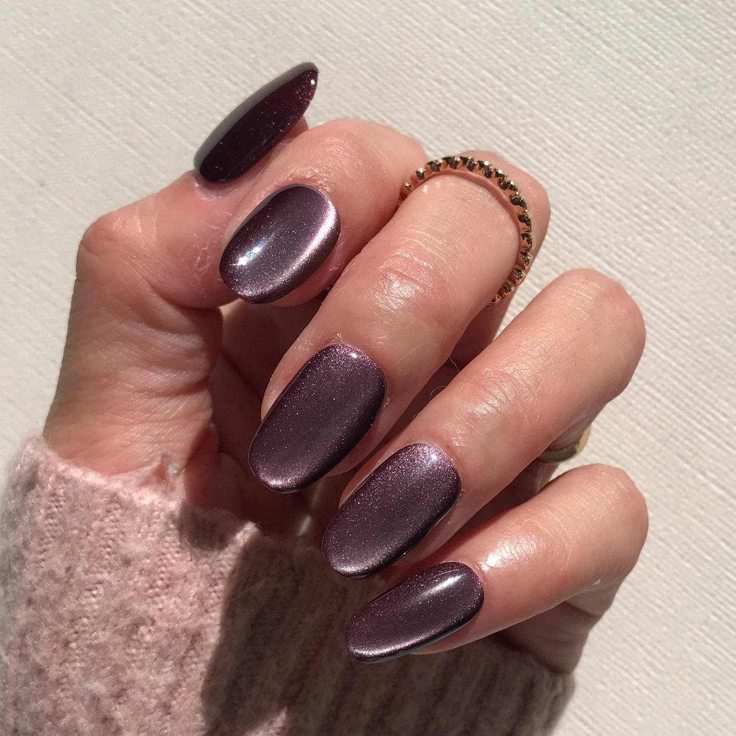 Handmade metallic purple press-on in natural oval shape. 