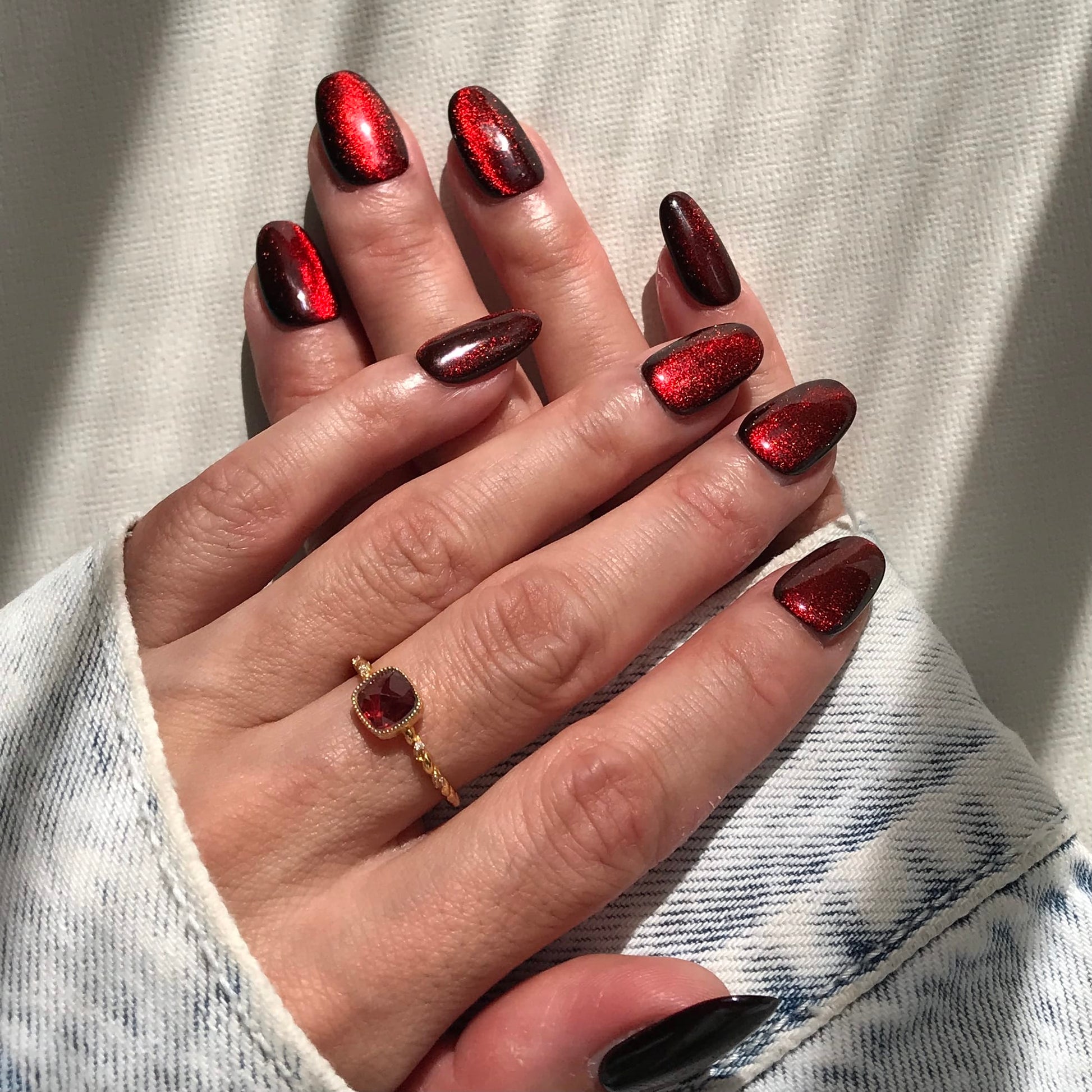 Calm Storm premium handmade press-on nails in metallic red.