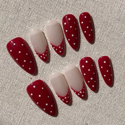 Calm Storm premium handmade press-on nails in red and white polka dot  design.