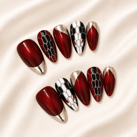 Calm Storm premium handmade press on nails with ruby red and geometric design.