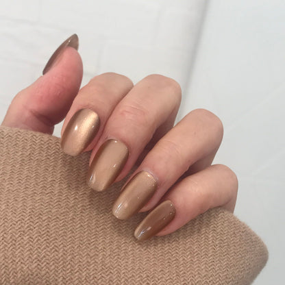 Calm Storm premium toffee cat eye press on nails close up. 