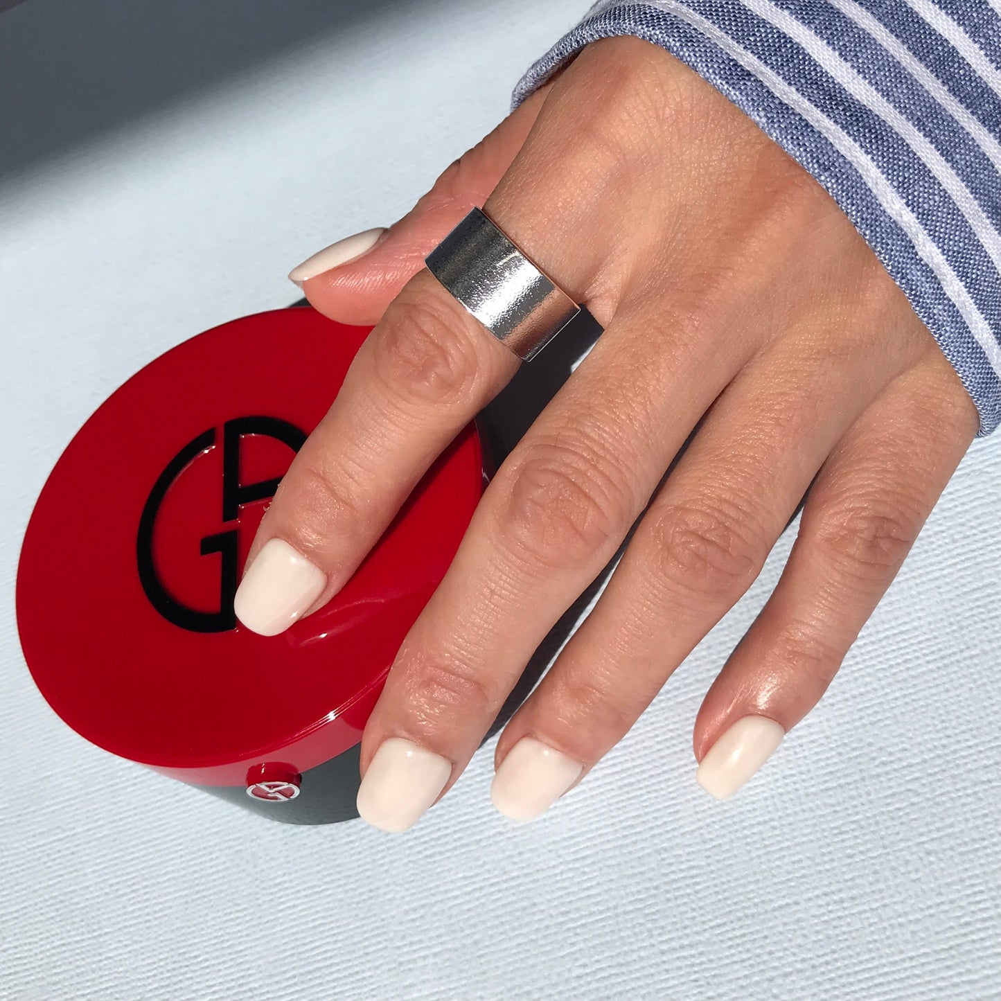 Salon finish high gloss white press-on nails in short square. 